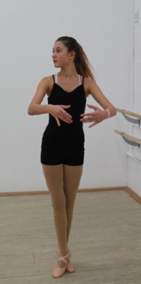 Young girl practicing dance moves